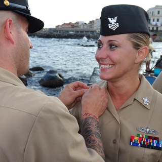 Ericka Mckim advancing to First Class Petty Officer at Aci Trezza Port, when stationed with NAS Sigonella Sicily